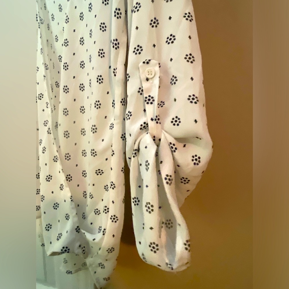 Black and white patterned faux wrap top